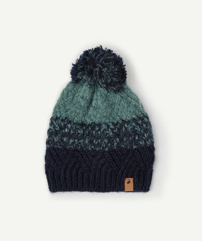Outlet radius - KNITTED HAT IN SHADES OF BLUE WITH A POMPOM
