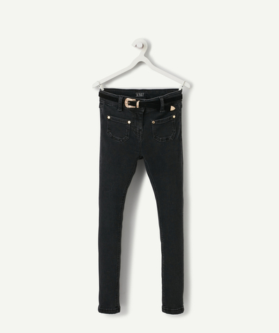 BOTTOMS radius - BLACK SKINNY JEANS WITH A COWBOY INSPIRED BELT