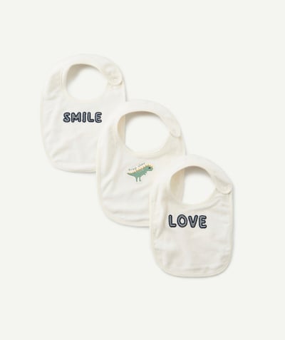 Nursery Tao Categories - THREE CREAM TOWELLING BIBS WITH A DESIGN OR A MESSAGE