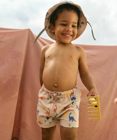 Baby-boy radius - BEIGE SWIMMING TRUNKS IN RECYCLED FIBRES WITH DINOSAUR DESIGNS