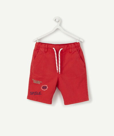 Low prices radius - STRAIGHT RED SHORTS WITH AN EMBROIDERED MESSAGE