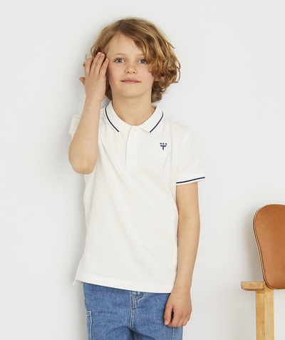 Boy radius - WHITE AND BLUE POLO SHIRT WITH A DESIGN OVER THE HEART
