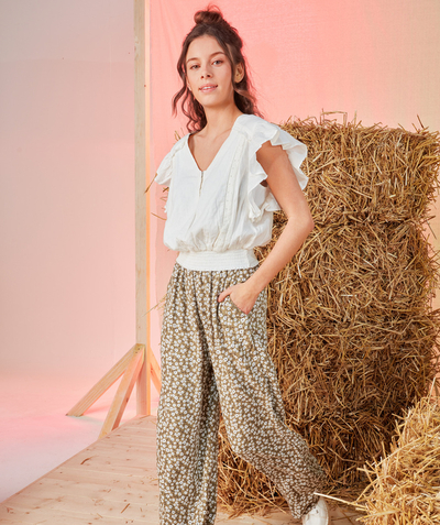 New collection Sub radius in - FLOWING TROUSERS FOR GIRLS IN ECO-FRIENDLY KHAKI VISCOSE WITH A FLORAL PRINT