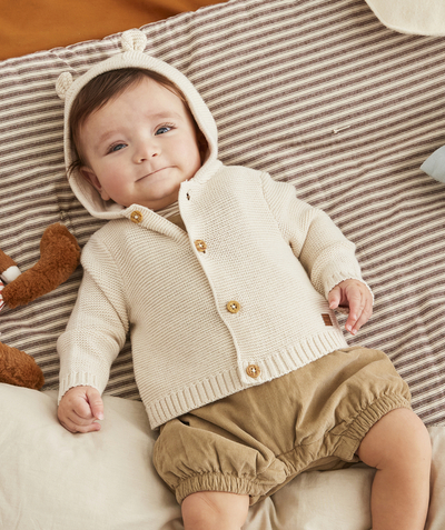 Outlet radius - BABIES' CREAM HOODED KNITTED JACKET