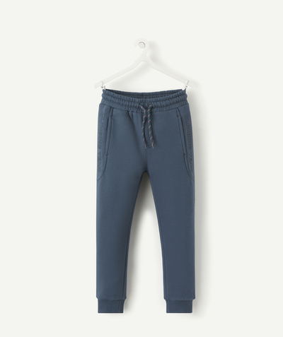 Sportswear radius - BOYS BLUE JOGGING PANTS IN RECYCLED COTTON WITH A MESSAGE