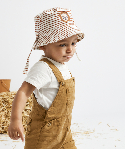 Hat, cap Tao Categories - BABY BOYS' REVERSIBLE BUCKET HAT IN PRINTED AND STRIPED COTTON