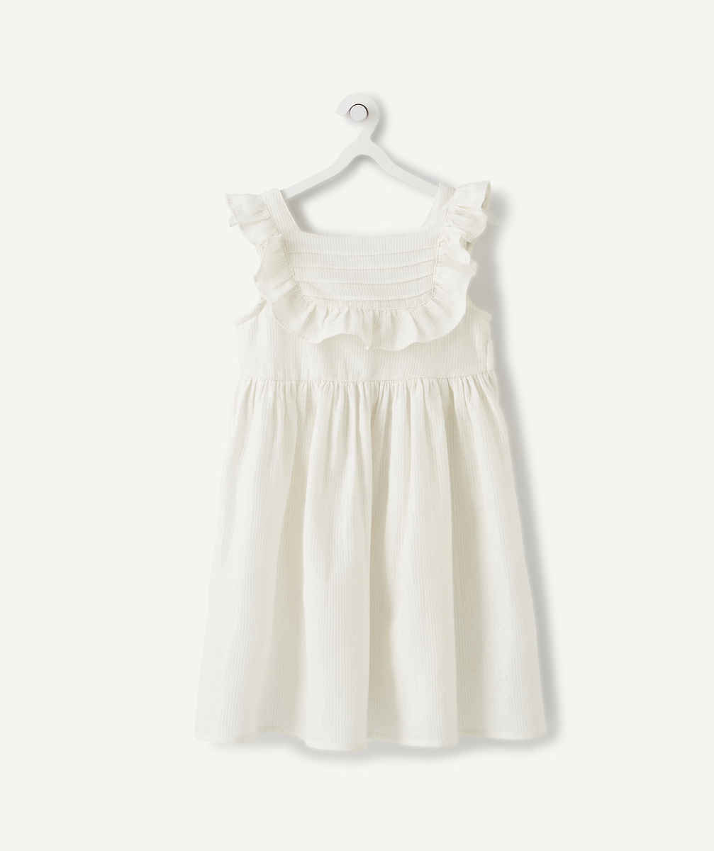 La robe blanche avec liserés pailletés - 14 A